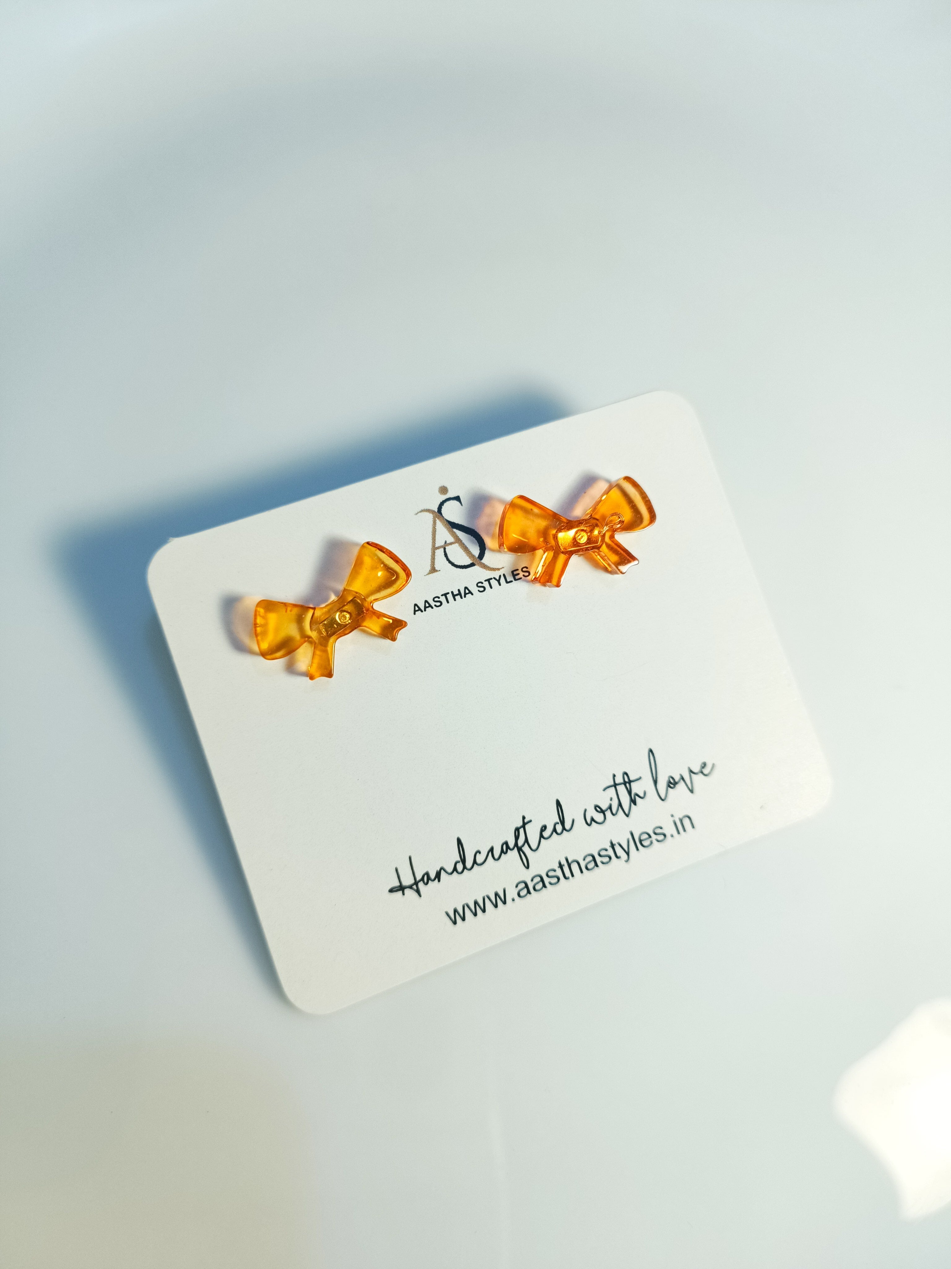 Orange Bow Resin Studs